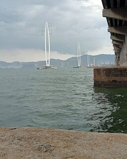 За спокойствием и своим уловом к мосту на острове Пенанг