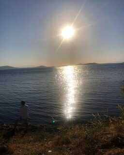 Удочки на закате у Айвалыка на Эгейском море