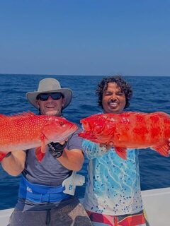 Две красные рыбы на джиг одновременно у острова Ратленд на Андаманах