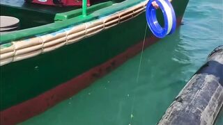 Ловля ската: морская рыбалка в Санья, на острове Хайнань, Китай