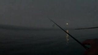 Лдзаа, Абхазия. Утренняя рыбалка рокфишинг у берега.