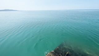 Новый Афон жара и пирс дневная рыбалка в тени навеса