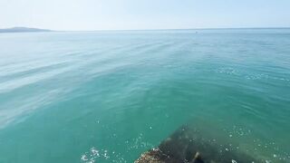 Новый Афон жара и пирс дневная рыбалка в тени навеса