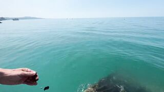 Новый Афон жара и пирс дневная рыбалка в тени навеса