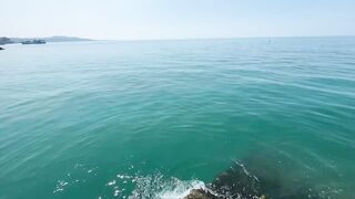 Новый Афон жара и пирс дневная рыбалка в тени навеса