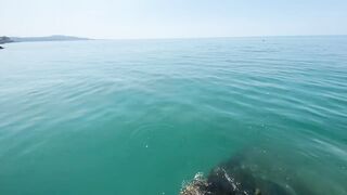 Новый Афон жара и пирс дневная рыбалка в тени навеса