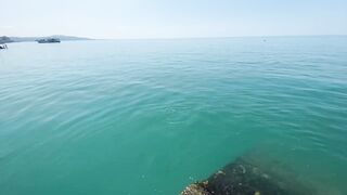 Новый Афон жара и пирс дневная рыбалка в тени навеса