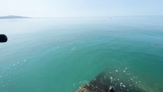 Новый Афон жара и пирс дневная рыбалка в тени навеса