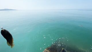 Новый Афон жара и пирс дневная рыбалка в тени навеса