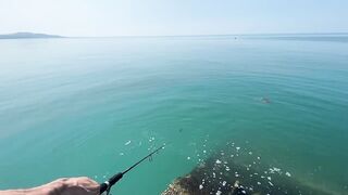 Новый Афон жара и пирс дневная рыбалка в тени навеса