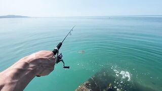 Новый Афон жара и пирс дневная рыбалка в тени навеса