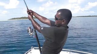 Gaafu Dhaalu экспедиция морская рыбалка на GT 41.5 кг и команда капитана