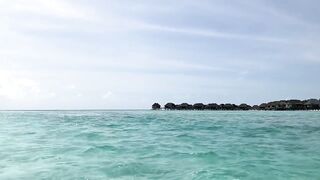 Huraa Island, Maldives: канал, лодки-дони и вечерние силуэты пальм