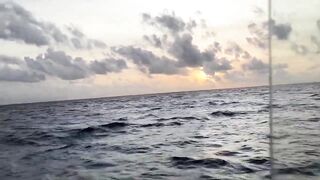 Huraa Island, Maldives: канал, лодки-дони и вечерние силуэты пальм