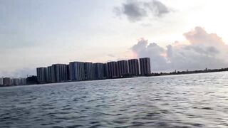 Huraa Island, Maldives: канал, лодки-дони и вечерние силуэты пальм