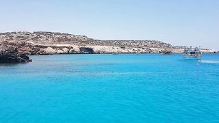 Cape Greco, Cyprus — Blue Lagoon: катер, рифы и клев по краю