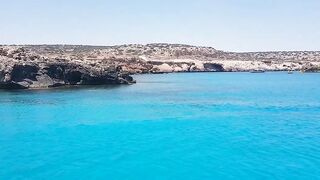 Cape Greco, Cyprus — Blue Lagoon: катер, рифы и клев по краю