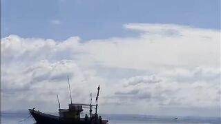 Морской выход у Байтхома на Фукуоке под дождем