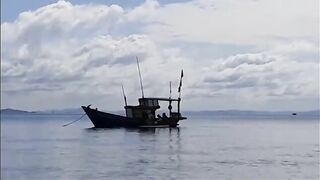 Морской выход у Байтхома на Фукуоке под дождем