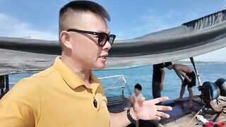 С ребенком на рыбацкой лодке Кото: удочка и ловушки для кальмара