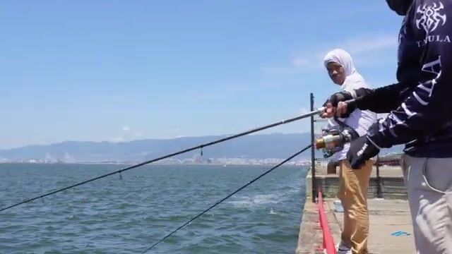 К морю на электричке: рыбалка с городского берега в Осаке