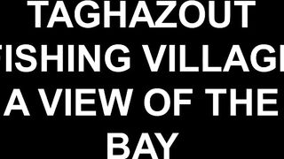 Taghazout fishing village - вид на бухту и точки у камней