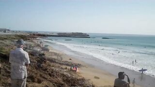 Taghazout fishing village - вид на бухту и точки у камней