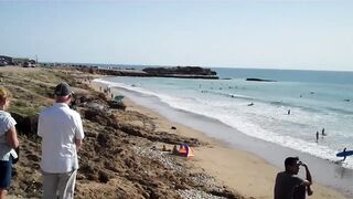 Taghazout fishing village - вид на бухту и точки у камней