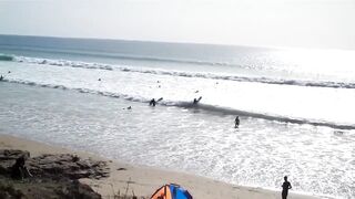 Taghazout fishing village - вид на бухту и точки у камней