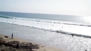 Taghazout fishing village - вид на бухту и точки у камней