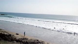 Taghazout fishing village - вид на бухту и точки у камней