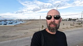 Asilah, Morocco - приморский променад и рыбалка на закате