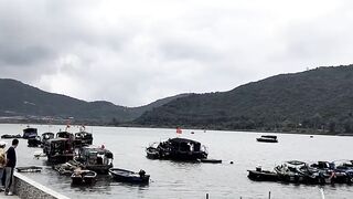 Хайнань, Ялунвань: рыбацкий порт — разгрузка неводов и аукцион