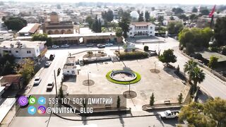 Гюзельюрт районы Северного Кипра спокойная жизнь на холмах цитрусовые сады и бирюзовое море рядом