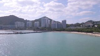 Dadonghai Sanya Hainan прогулка по бухте городской пляж и мысли о рыбалке с берега