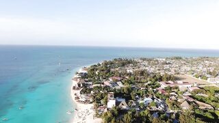 Пляж Nungwi Zanzibar от рассвета до заката и как проходит день у моря с лодками рыбаков