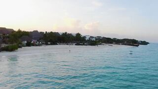 Пляж Nungwi Zanzibar от рассвета до заката и как проходит день у моря с лодками рыбаков
