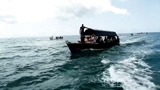 Uroa и Chwaka Zanzibar громкий конфликт на берегу океана полиция на пляже и тревожная атмосфера