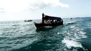 Uroa и Chwaka Zanzibar громкий конфликт на берегу океана полиция на пляже и тревожная атмосфера