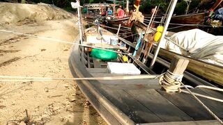 Рыбацкие лодки в устье реки у Nai Yang Phuket утро на море и подготовка к выходу