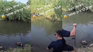 Необычная рыбалка огромный черный карп на крючке и эмоции израильского рыбака на видео