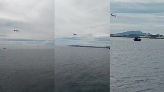 Рыбалка с видом на самолёты Cam Ranh Khánh Hòa, когда вдоль пляжа идут заходы на посадку