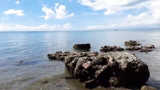 В Talisay Cebu море и рыба по настоящему свежие рыбачим сетями прямо у берега города