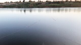 Вечерний клев в Керчи закат над морем и частые поклевки на набережной