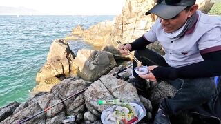 Рыбалка в Нячанге у Hang Heo встреча со стаей groupers у скалистого берега моря