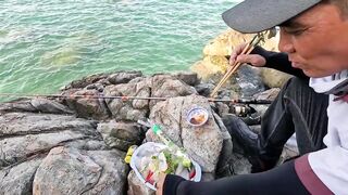 Рыбалка в Нячанге у Hang Heo встреча со стаей groupers у скалистого берега моря