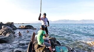 Рыбалка в Нячанге у Hang Heo встреча со стаей groupers у скалистого берега моря