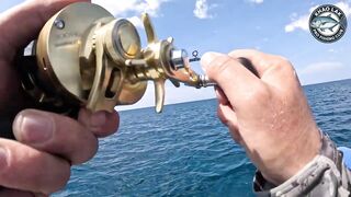 Diamond trevally тянет шнур, спиннинг гнётся дугой у берегов Khao Lak Thailand