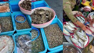 Рынок Da Nang, Вьетнам: красные крабы, лангусты и улов местных рыбаков после ночной рыбалки